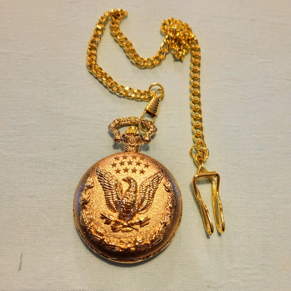 Gold Toned Pocket Watch with Eagle Design. Japan Muvment.